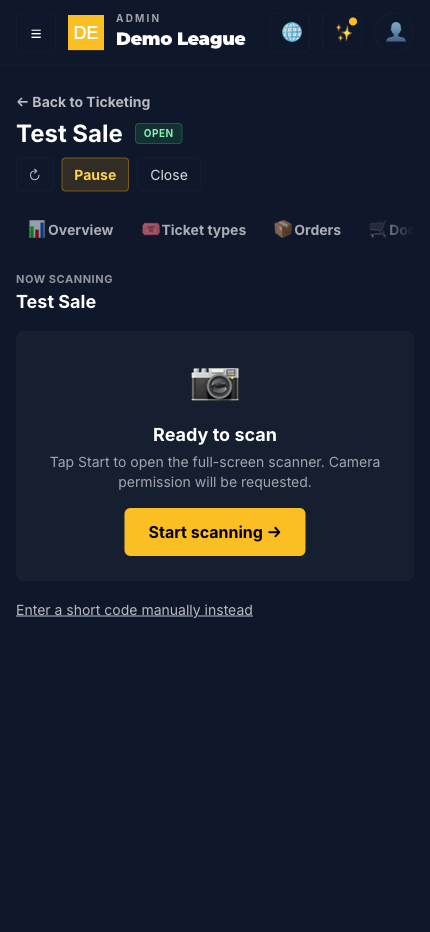 Full-screen scanner kiosk with camera reticle, scan tally chip, and a green VALID result card